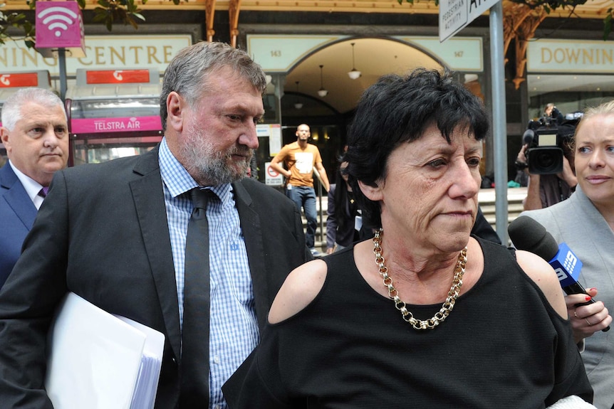 Greg and Virginia Hughes leave the last day of the coronial inquiry into their son's death.