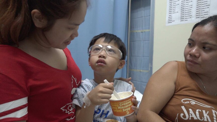 Denielle Josua Pagco, 10, using his eyes after surgery.