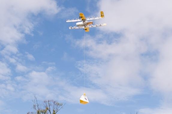 A drone delivers a package