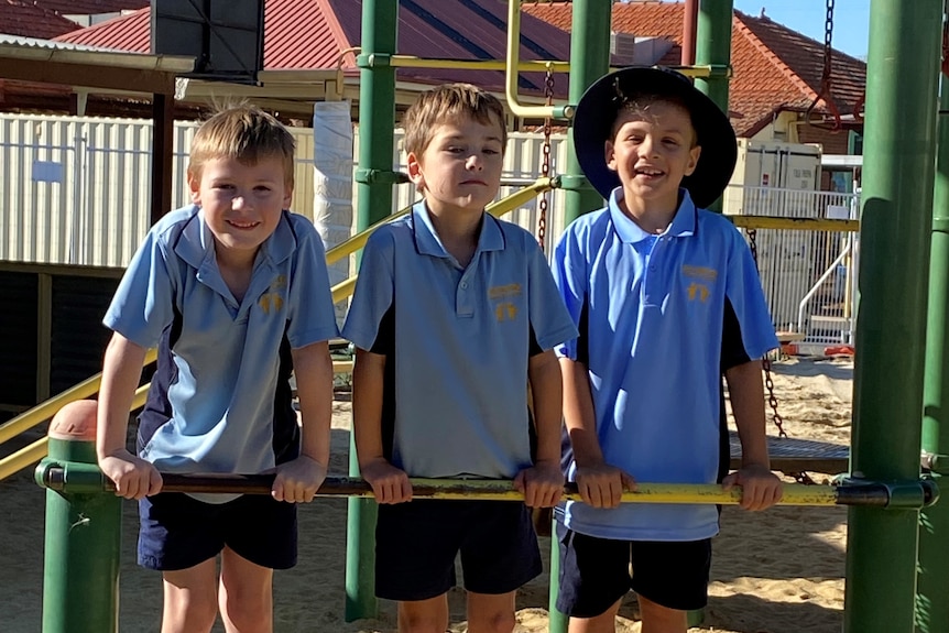 Three boys on a playground 