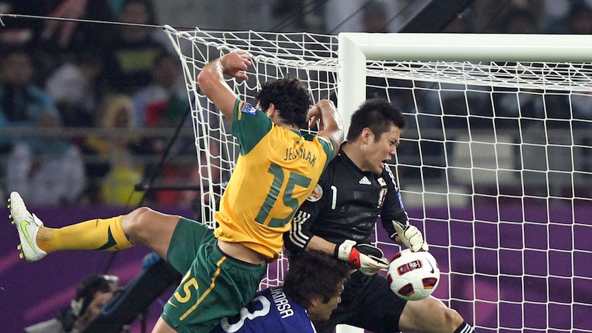 Dream over: Goalkeeper Eiji Kawashima was instrumental in Japan's fourth Asian Cup victory.