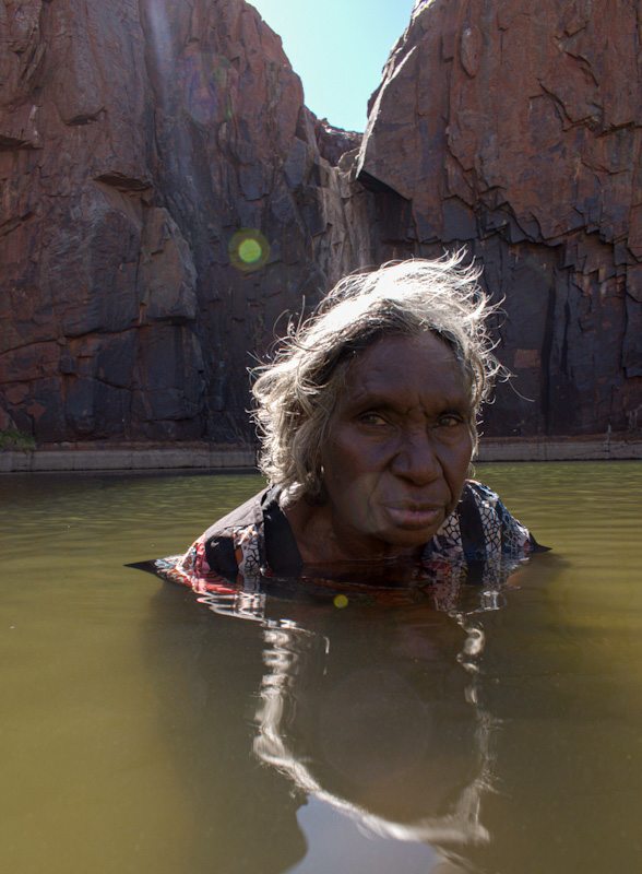 A woman submerged in water