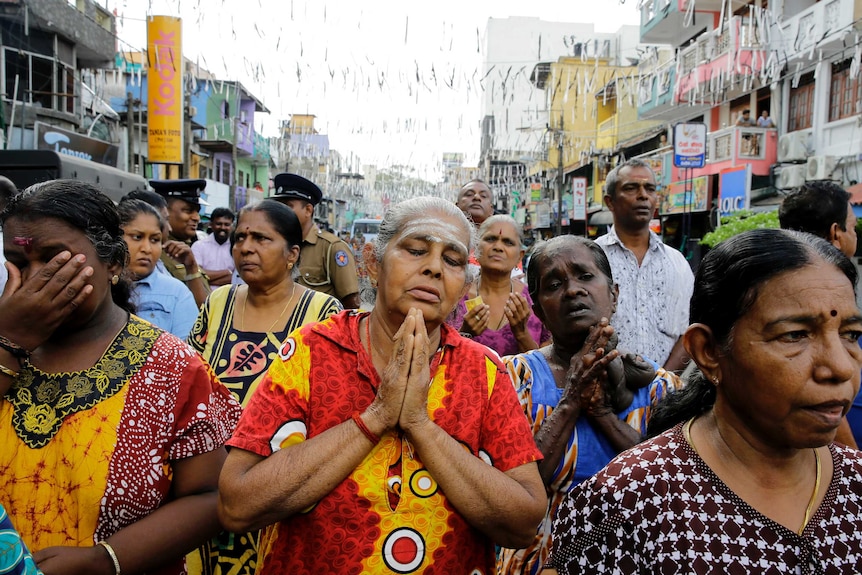 Sri Lankan Catholics praying outside the exploded St. Anthony's Church