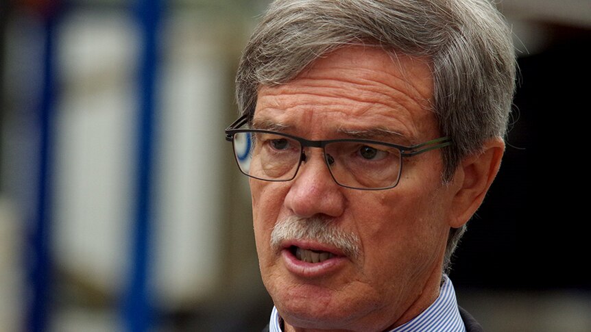 A close-up of WA Treasurer Mike Nahan frowning.