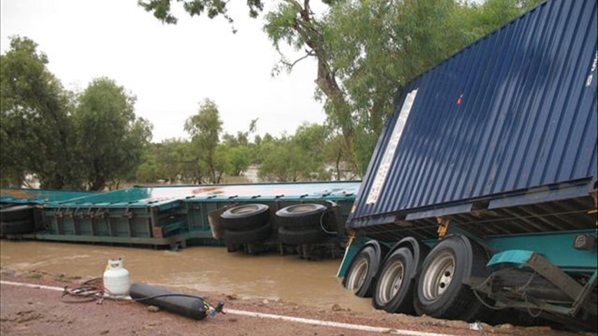 A truck roll-over has forced the closure of the Landsborough highway.