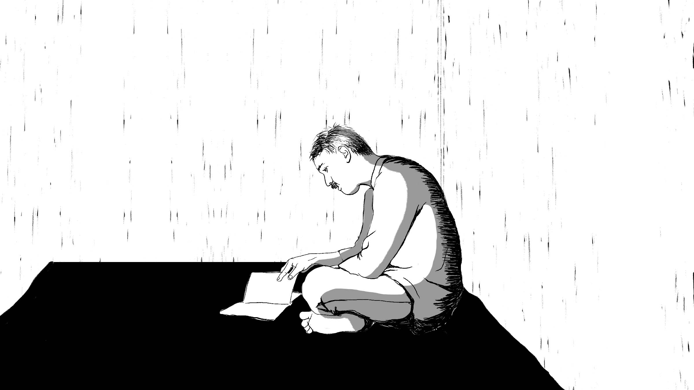 A man reading the Koran.