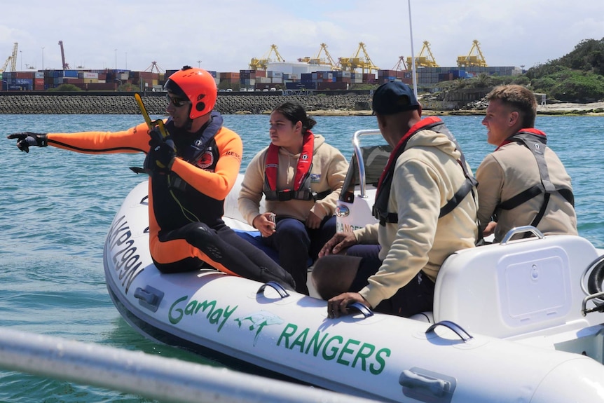 Gamay Rangers and National Parks staff direct whale disentanglement training.