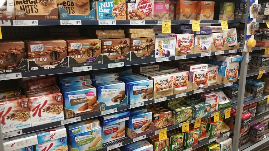 Muesli bars on the shelves of a supermarket