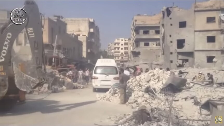A Syrian army fighter jet crashed into a busy marketplace in Ariha.