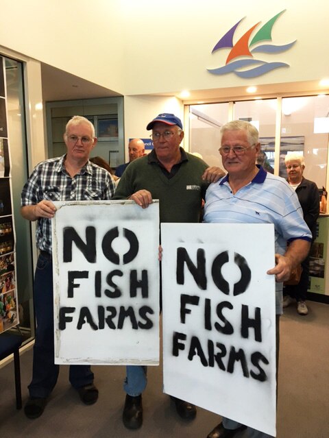 Protesters at the Glamorgan Council meeting over fish farming at Okehampton Bay.