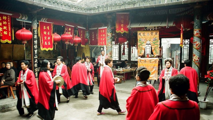 Ritual pacing inside Xuanling Daoist Temple in Wenzhou, China.