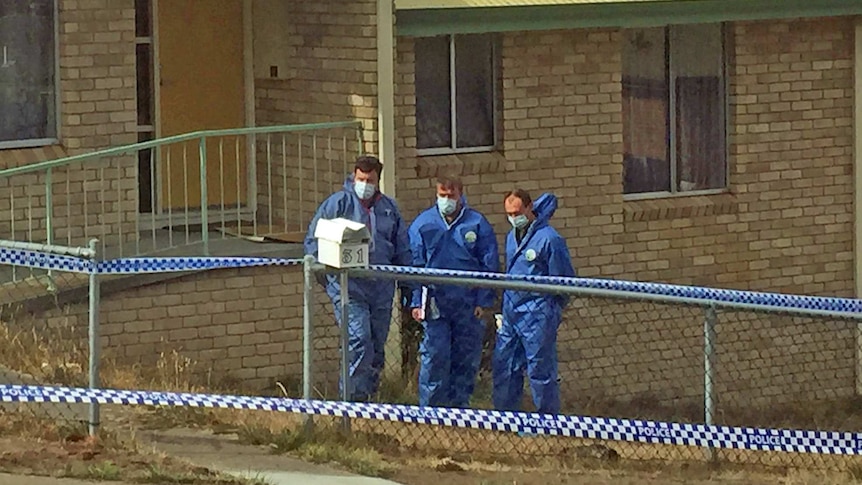 Investigators at crime scene in Lutana