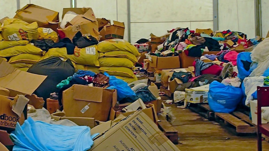 A pile of boxes full of donated goods sent to disaster zones