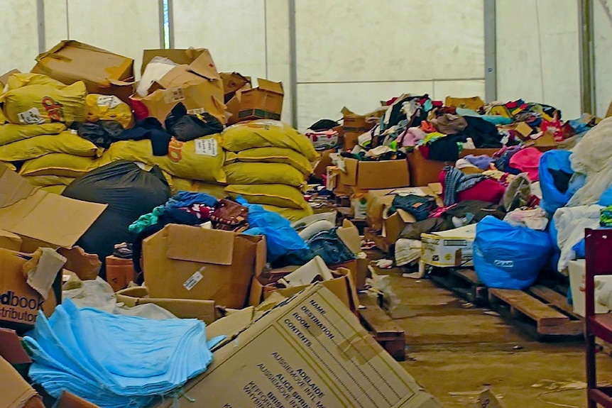 A pile of boxes full of donated goods sent to disaster zones
