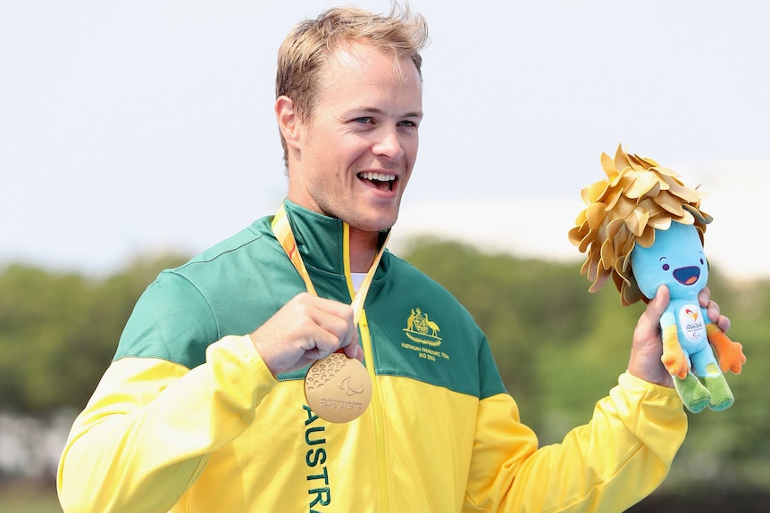 Australia's Curtis McGrath with his gold medal in the men's KL2 para-canoe event in Rio