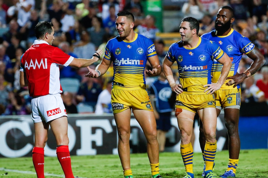 Parramatta Eels players with hands on hips