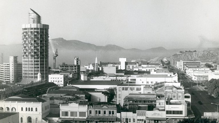 A black and white photo of Townsville's cityscape in the mid 70s. A round building, with what looks to be a spout, towers over.