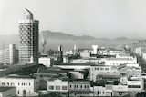 A black and white photo of Townsville's cityscape in the mid 70s. A round building, with what looks to be a spout, towers over.