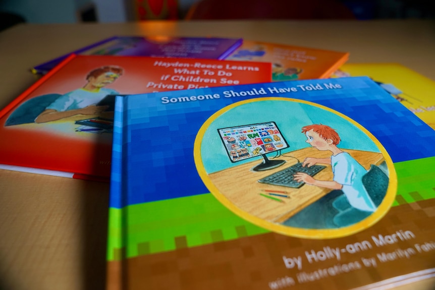 Children's books laid out on a table