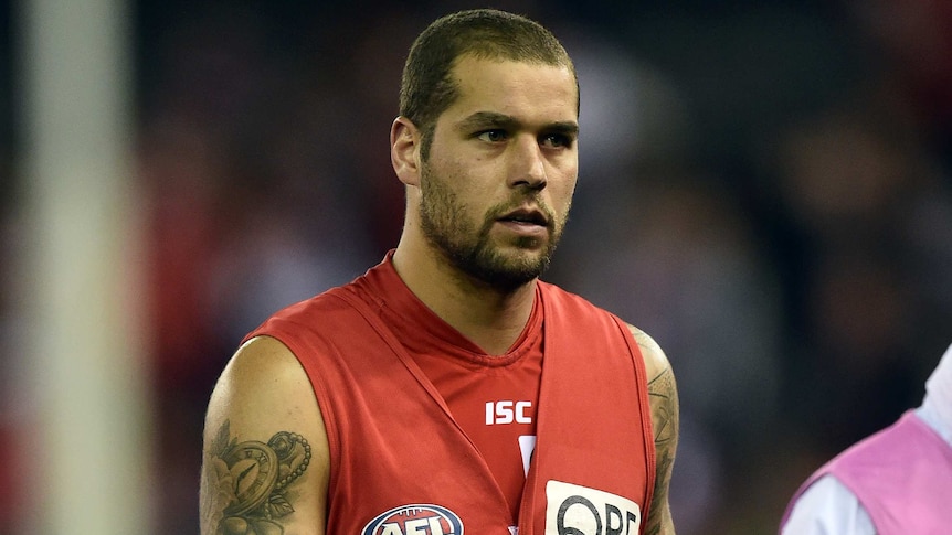 Sydney's Lance Franklin wears the substitute's red vest