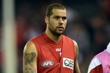 Sydney's Lance Franklin wears the substitute's red vest
