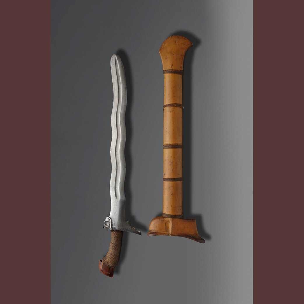 The wavey edged sword and its cover
