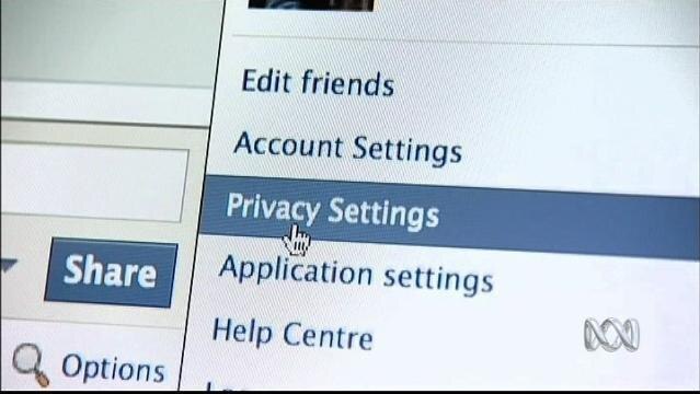 Close-up of computer screen, cursor highlights 'Privacy Settings'