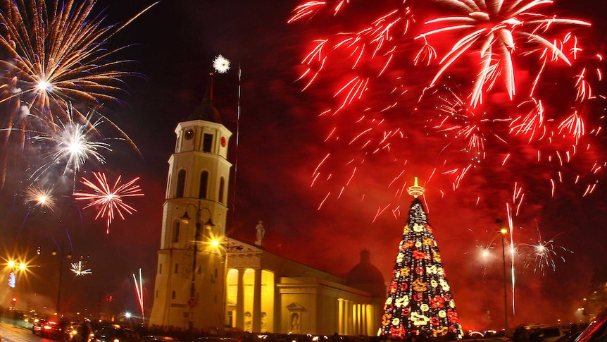Fireworks light up the sky above the Cathedral Square in Vilnius, Lithuania.