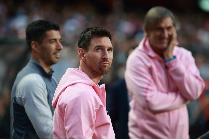 Lionel Messi looks over his shoulder
