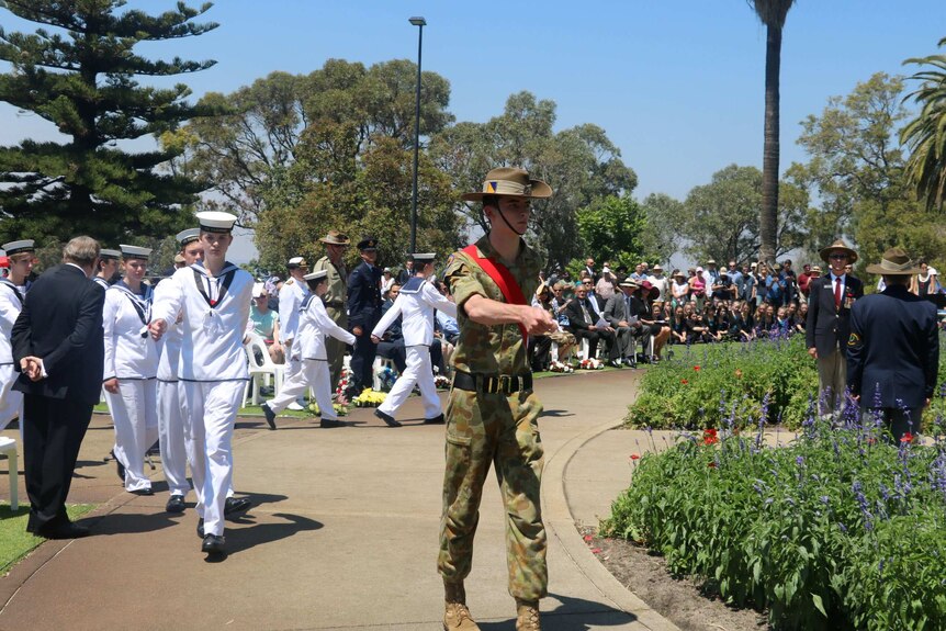 Navy and Army soldiers marching in Kings Park.