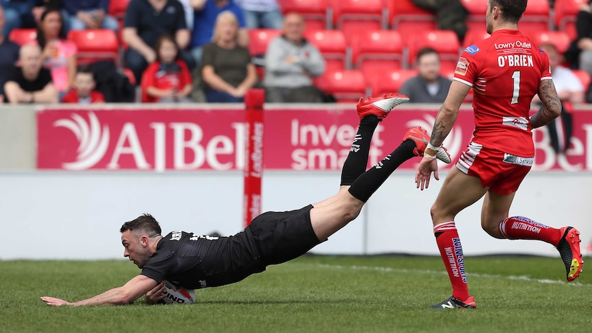 Ryan Brierley dives over to score a try for the Toronto Wolfpack.