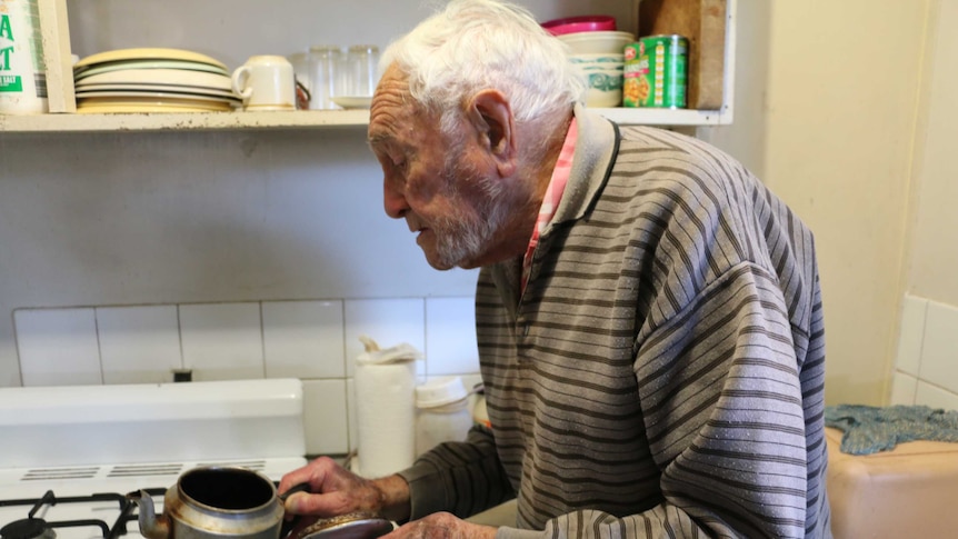 David Goodall makes a cup of tea at his flat