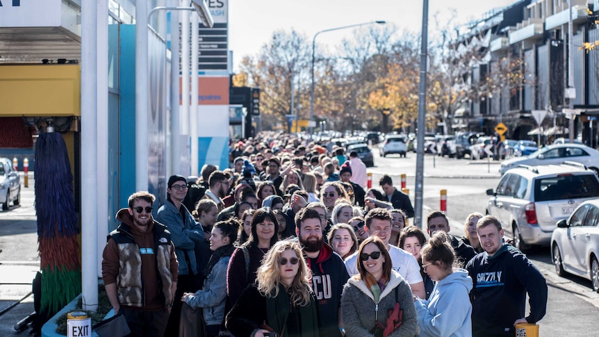 A line of hundreds of people waiting for tickets for the Spilt Milk music festival