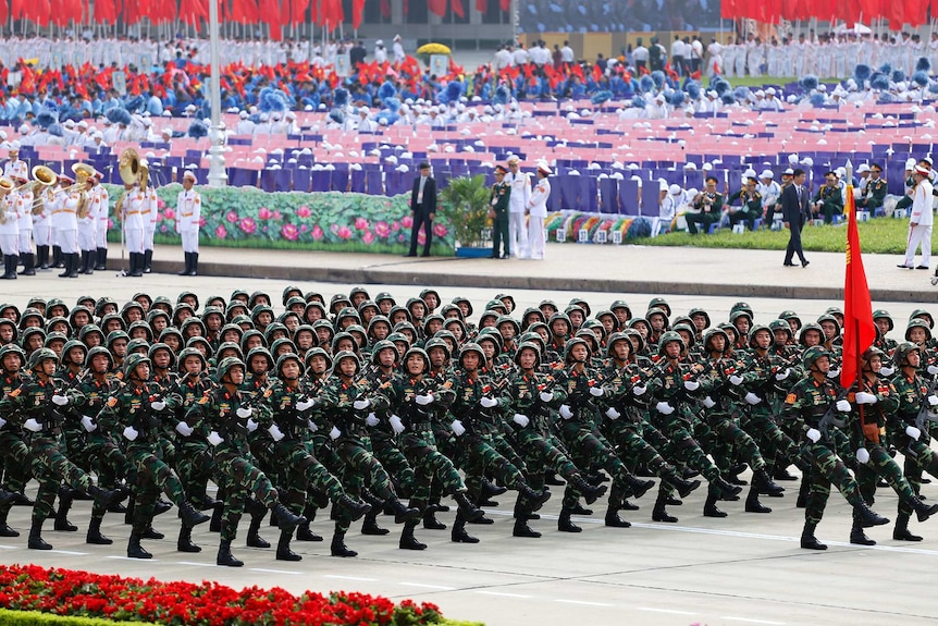 Representatives of the Vietnamese military march in Ba Dinh Square.