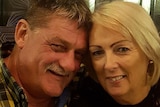 Gregory Roser and Sharon Graham, who on trial for the murder of Bruce Saunders in November 2017, smiling with heads together