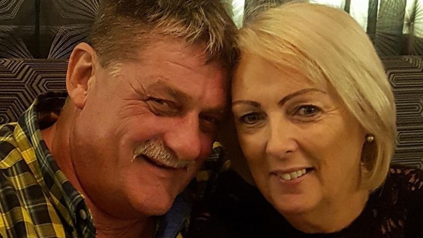 Gregory Roser and Sharon Graham, who on trial for the murder of Bruce Saunders in November 2017, smiling with heads together