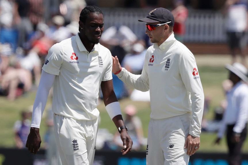 England cricket captain Joe Root talks to fast bowler Jofra Archer