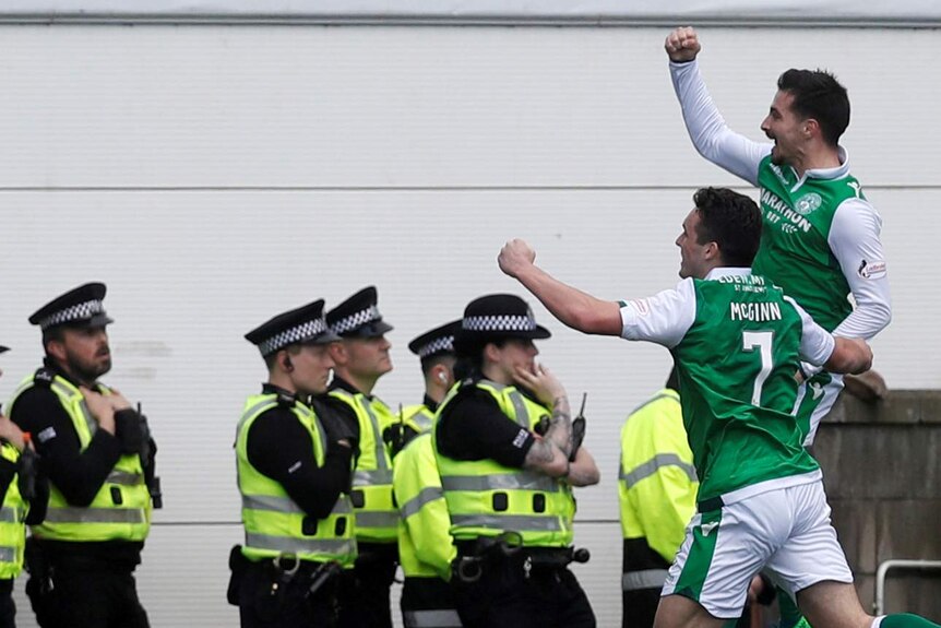 Jamie Maclaren celebrates a goal for Hibernian against Celtic