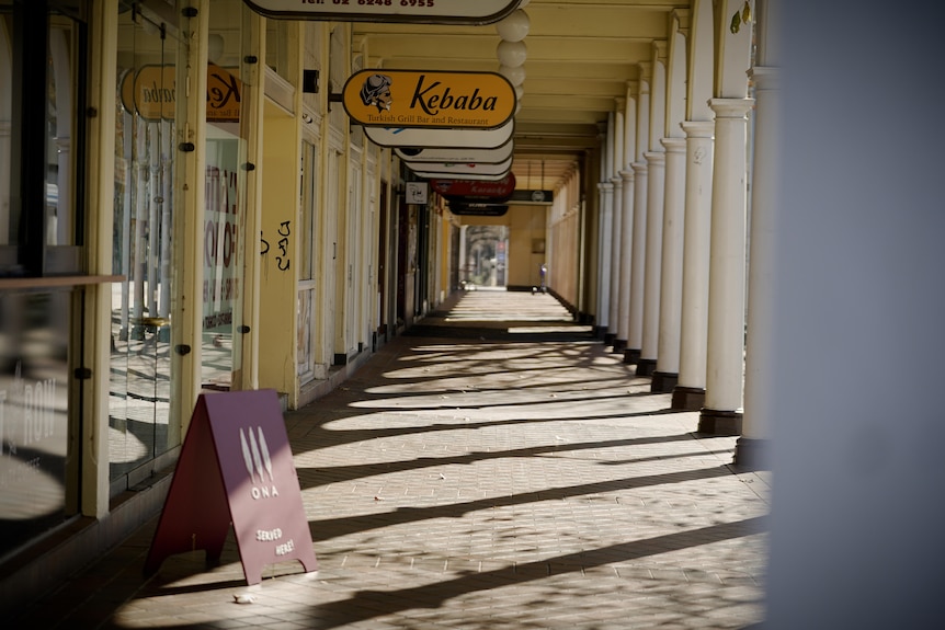 Coffee signs outside cafes with no one around 