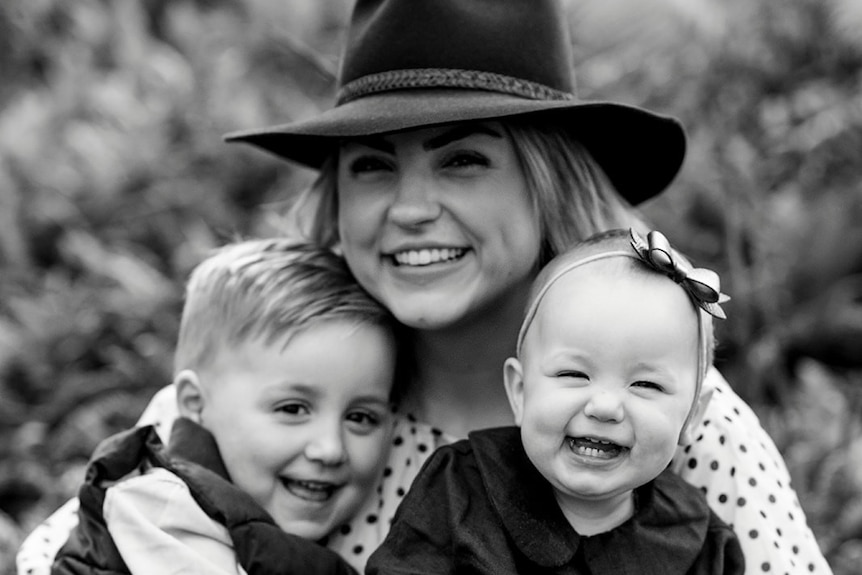 Ally and her kids in black and white