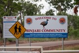 A sign saying welcome to binjari