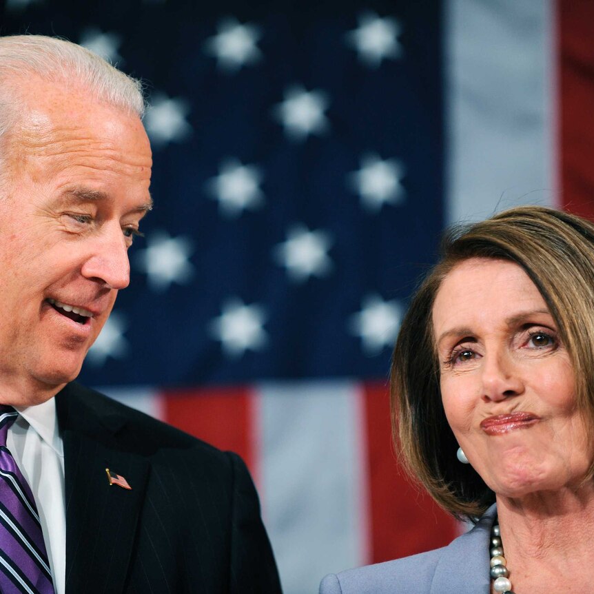 Joe Biden looking at Nancy Pelosi