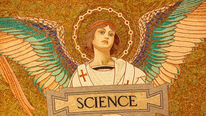 Image of an angel holding a placard with the word 'science' on it