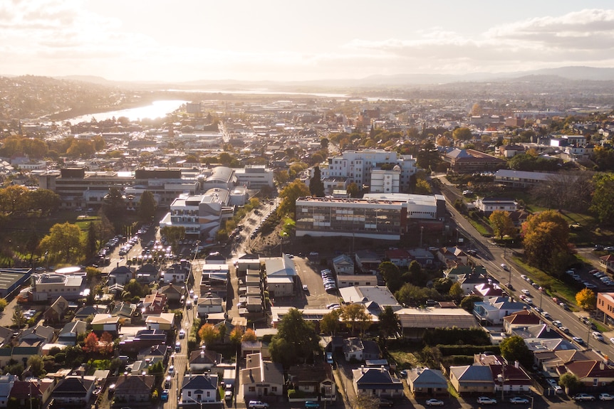 This aerial shot shows the sun rising over Launceston General Hospital.