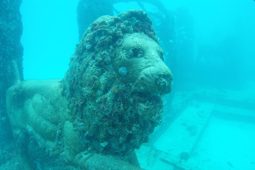 A lion statue at the Neptune Memorial Reef underwater cemetery in Florida in the United States