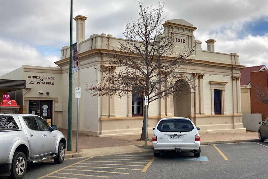 The Loxton Waikerie Council building. It has sandy coloured walls and maroon trimming.