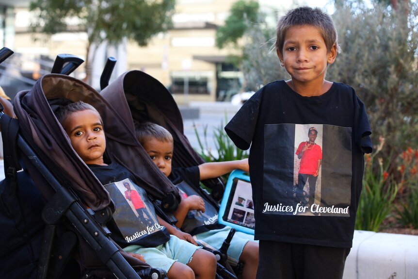 Kids with Justice For Cleveland shirts