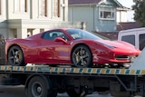 Police seize a Ferrari from the Balwyn home of Bobby Singh.