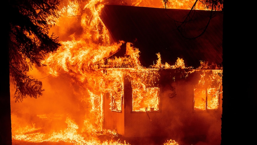 Flames consume a home