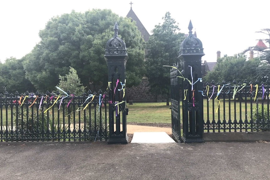 Ribbons tied the wrought-iron fence and gates outside St. Patrick's Catholic Cathedral in Ballarat.